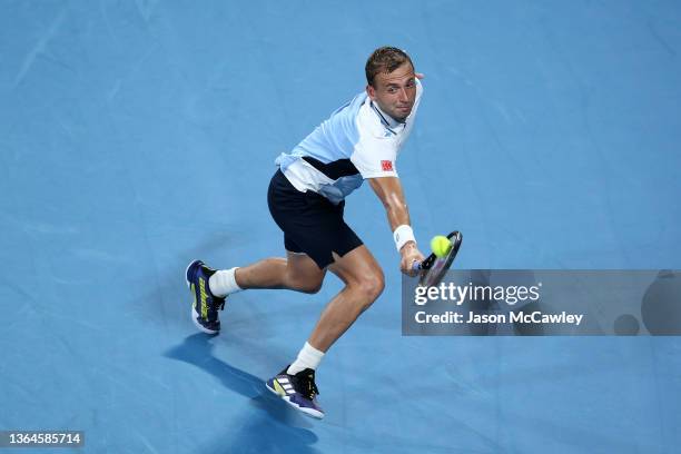 Daniel Evans of Great Britain hits a backhand in his semi final match against Aslan Karatsev of Russia during day six of the Sydney Tennis Classic at...