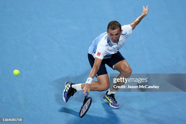 Daniel Evans of Great Britain hits a backhand in his semi final match against Aslan Karatsev of Russia during day six of the Sydney Tennis Classic at...