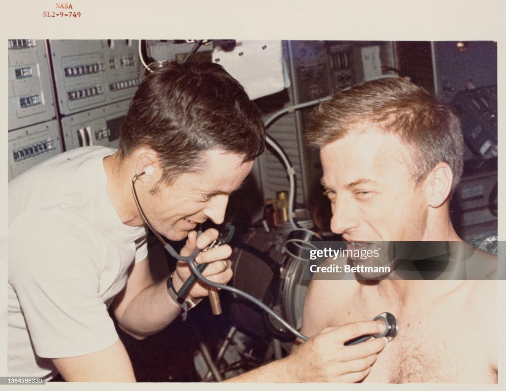 Paul J Weitz, Skylab II pilot, gets a physical examination