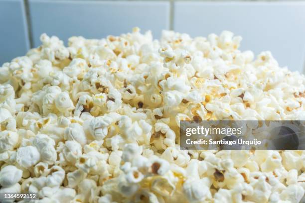 close-up of popcorn recently made - popcorn full frame stock pictures, royalty-free photos & images