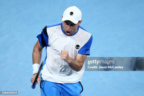 Aslan Karatsev of Russia celebrates match point in his semi final match against Daniel Evans of Great Britain during day six of the Sydney Tennis...