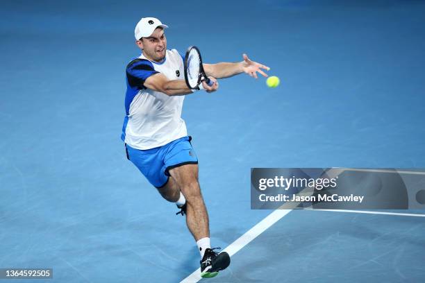 Aslan Karatsev of Russia hits a forehand in his semi final match against Daniel Evans of Great Britain during day six of the Sydney Tennis Classic at...