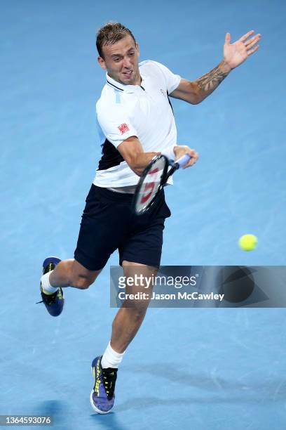 Daniel Evans of Great Britain hits a forehand in his match semi final against Aslan Karatsev of Russia during day six of the Sydney Tennis Classic at...