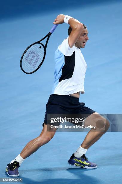 Daniel Evans of Great Britain hits a forehand in his match semi final against Aslan Karatsev of Russia during day six of the Sydney Tennis Classic at...