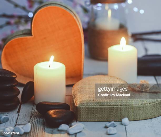 for valentine's day, a zen and romantic atmosphere for a moment of relaxation in a spa, in a cure center or at home - essence day stock pictures, royalty-free photos & images