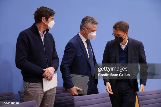 Charite Hospital Institute for Virology Director Christian Drosten, Robert Koch Institute President Lothar Wieler and Federal Health Minister Karl...