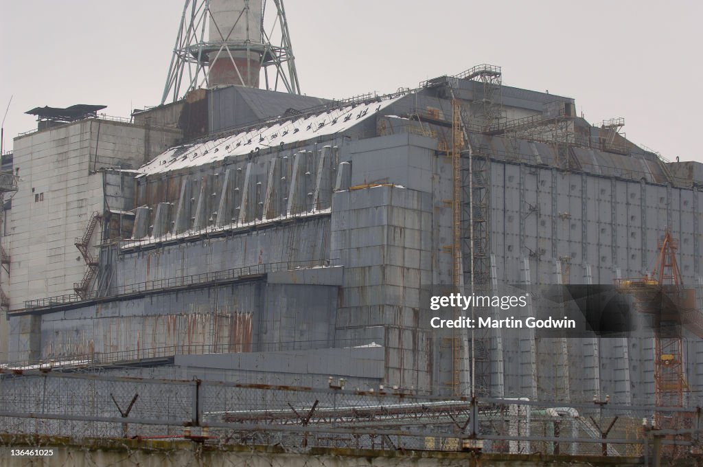 Reactor No 4 At The Chernobyl Nuclear Power Plant Encased In Its reactor-no-4-at-the-chernobyl-nuclear-power-plant-encased-in-its