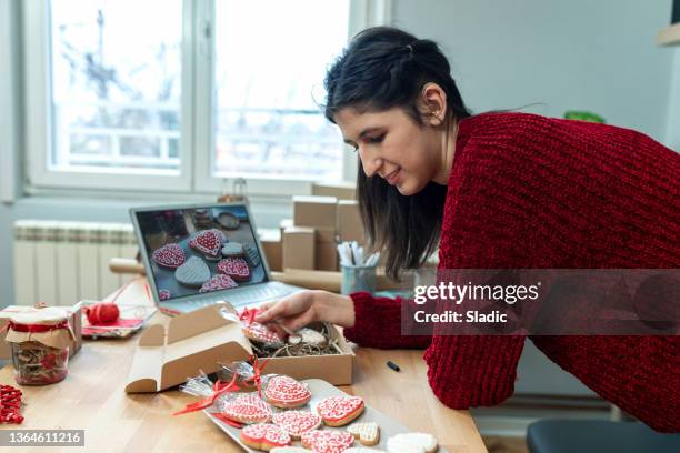 young woman with  disability . online business owner - valentine's day holiday stock pictures, royalty-free photos & images