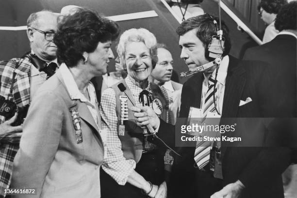 American broadcast journalist Dan Rather interviews and unidentified delegate on the floor of the Republican National Convention at Joe Louis Arena,...