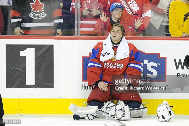 Andrei Makarov of Team Russia reacts after being defeated in overtime by Mika Zibanejad of Team Sweden during the 2012 World Junior Hockey...