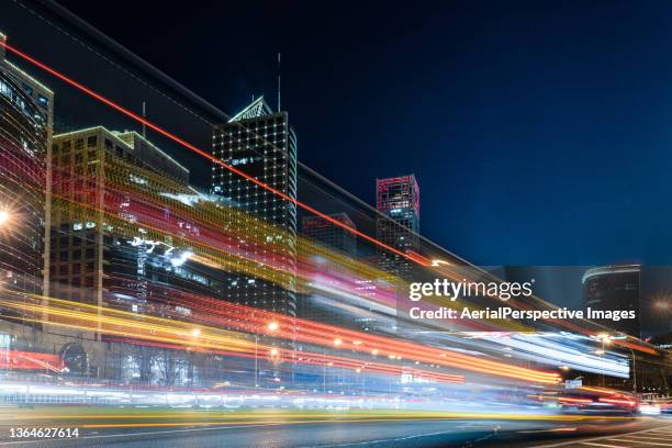 city traffic at night - beijing business stock pictures, royalty-free photos & images