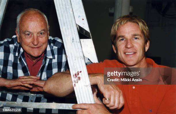 Portrait of American film director James Ivory and actor Matthew Modine as they lean on a ladder in a barn at Ivory's home, Claverack, New York, 1993.