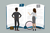 Two business people or employees reads open guide book or user manual. Finding answers, solving problems, FAQ concept. Teamwork, brainstorming.