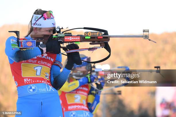 Justine Braisaz-Bouchet of France and Mona Brorsson of Sweden compete during the Women's 4x6 km Relay Competition at the IBU World Cup Biathlon...