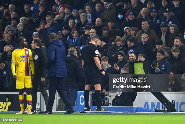 The match referee Robert Jones awards a penalty to Brighton after a VAR check during the Premier League match between Brighton & Hove Albion and...