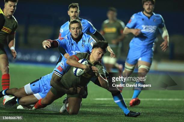 Harlequins player Marcus Smith dives over for their fifth try during the Heineken Champions Cup match between Cardiff Rugby and Harlequins at Cardiff...
