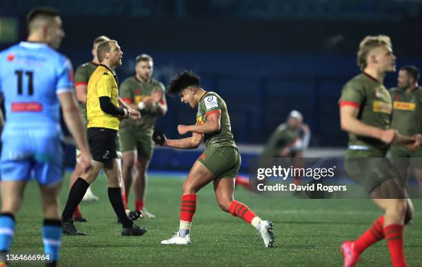 Harlequins player Marcus Smith celebrates after his last minute penalty seals a 36-33 victory during the Heineken Champions Cup match between Cardiff...