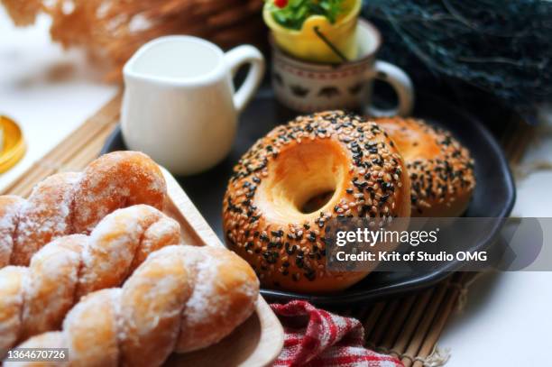 seasame donuts and icing bread - carbohydrate structure stock pictures, royalty-free photos & images