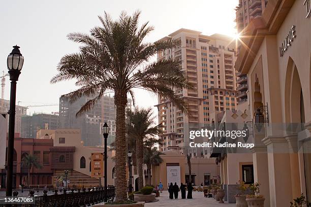 Detailed view of the still under construction man-made peninsula project called The Pearl with its high-rise office buildings, hotels, luxury shops...