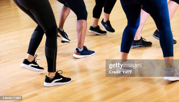 legs of five women in dance exercise class - dancing feet stock pictures, royalty-free photos & images