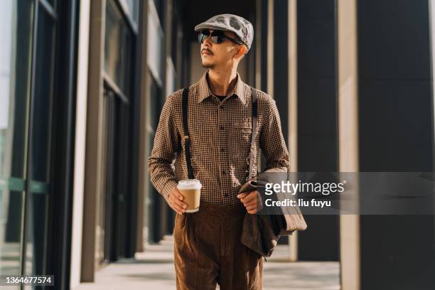 business man - brown hat stockfoto's en -beelden