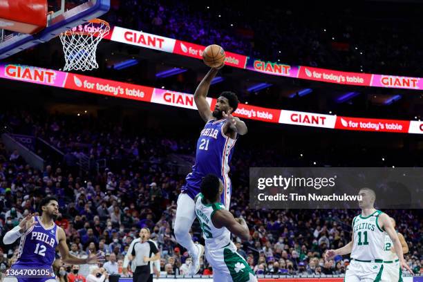 Joel Embiid of the Philadelphia 76ers elevates for a dunk during the fourth quarter against the Boston Celtics at Wells Fargo Center on January 14,...