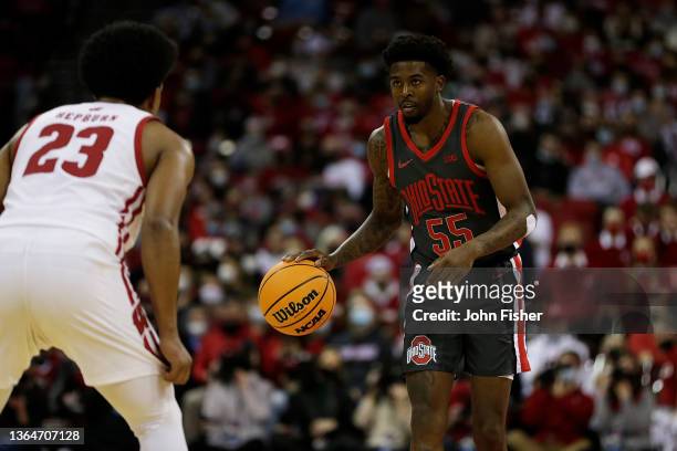 Jamari Wheeler of the Ohio State Buckeyes dribbles the basketball up court during the first half of the game against the Wisconsin Badgers at Kohl...