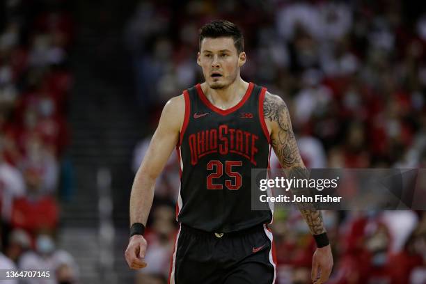 Kyle Young of the Ohio State Buckeyes walks down court during the first half of the game against the Wisconsin Badgers at Kohl Center on January 13,...