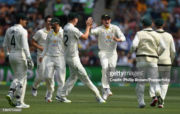 Marnus Labuschagne of Australia celebrates after running out Rory Burns of England during day two of the Fifth Test in the Ashes series between...