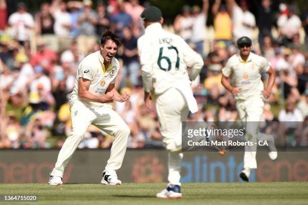 Australian captain Pat Cummins celebrates the wicket of Zak Crawley of England during day two of the Fifth Test in the Ashes series between Australia...
