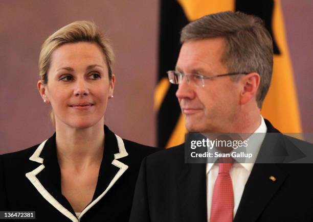 German President Christian Wulff and his wife Bettina receive child Epiphany carolers at Schloss Bellevue presidential palace on January 6, 2011 in...