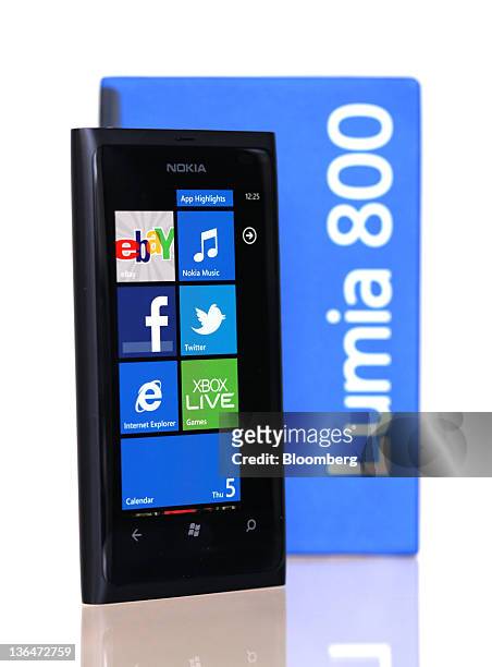 Nokia Lumia 800 smartphone is seen beside its presentation box in this arranged photograph in London, U.K., on Thursday, Jan. 5, 2012. Nokia Oyj will...