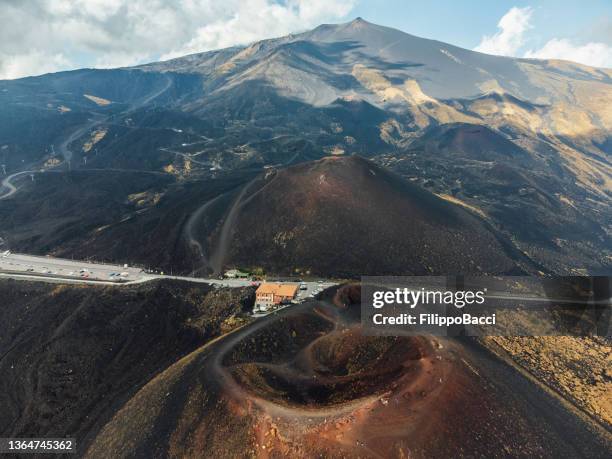 aerial view of mount etna, an active volcano in sicily, italy - active volcano stockfoto's en -beelden