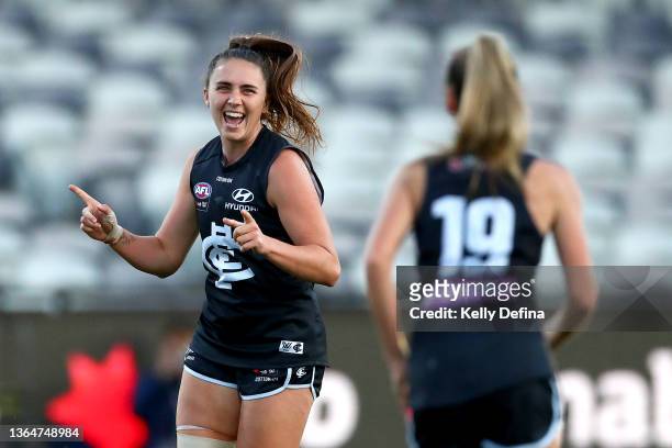Courtney Jones of the Blues celebrates her goalduring the round two AFLW match between the Geelong Cats and the Carlton Blues at GMHBA Stadium on...