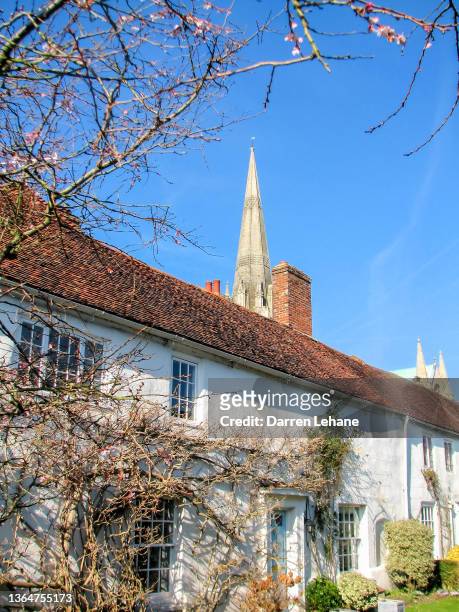 cottage and chichester cathedral - chichester stock pictures, royalty-free photos & images