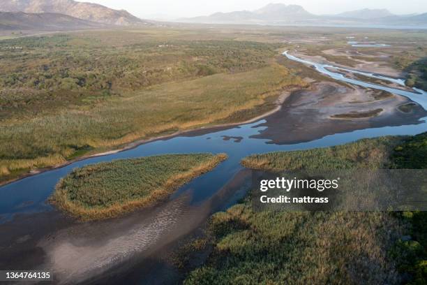 aerial view over a pristine estuary near the coast stock - overberg stock pictures, royalty-free photos & images