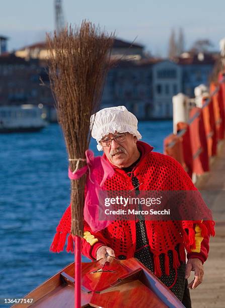 Gianni Colombo called "timbro" put some final touches ahead of the 34th Befana Regata on January 6, 2012 in Venice, Italy. In Italian folklore,...