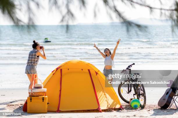 beach camping - beach party stock pictures, royalty-free photos & images