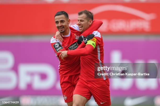 Hendrick Zuck of 1.FC Kaiserslautern celebrates after scoring his team`s third goal with team mate Kenny Prince Redondo of 1.FC Kaiserslautern during...