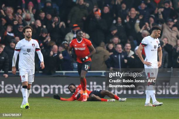 Emiliano Marcondes and Lloyd Kelly of Bournemouth after Kal Naismith of Luton Town scores a goal to make it 3-2 during the Sky Bet Championship match...