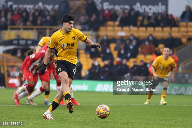 Raul Jimenez of Wolverhampton Wanderers scores their team's first goal from the penalty spot during the Premier League match between Wolverhampton...