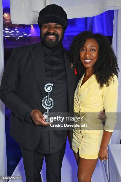 Gregory Porter, winner of the Best Male award, and Beverley Knight attend the Nordoff and Robbins O2 Silver Clef Awards at the JW Marriott Grosvenor...