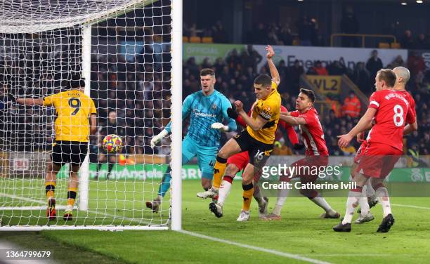 Conor Coady of Wolverhampton Wanderers scores their team's second goal during the Premier League match between Wolverhampton Wanderers and...