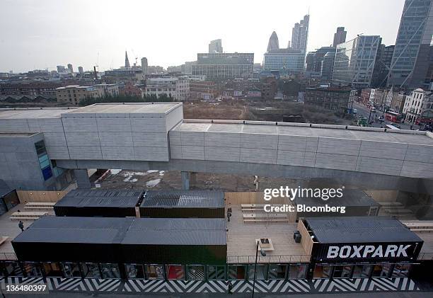 The Boxpark pop-up shopping mall stands in London, U.K., on Wednesday, Jan. 4, 2012. Sixty shipping containers form a temporary retail mall...