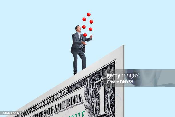 balancing  and juggling finances - juggling stock pictures, royalty-free photos & images