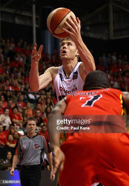 Cameron Tovey of the Wildcats lays up during the round 14 NBL match between the Perth Wildcats and the Melbourne Tigers at Challenge Stadium on...