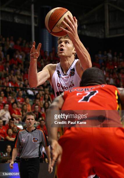Cameron Tovey of the Wildcats lays up during the round 14 NBL match between the Perth Wildcats and the Melbourne Tigers at Challenge Stadium on...