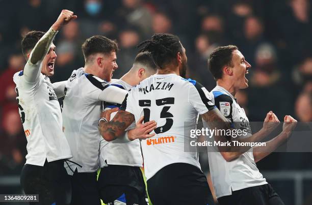 Colin Kazim-Richards of Derby County celebrates with teammates after their sides victory during the Sky Bet Championship match between Derby County...