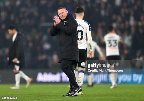 Wayne Rooney, Manager of Derby County applauds fans after their sides victory during the Sky Bet Championship match between Derby County and...
