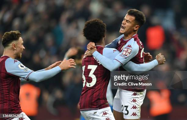 Philippe Coutinho of Aston Villa celebrates with teammate Carney Chukwuemeka after scoring their side's second goal during the Premier League match...
